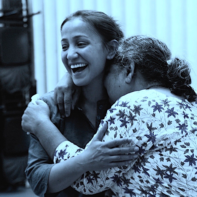 Amina Khayyam with a participant during Inter-Action